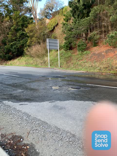 Pavement - Damaged — a report photo
