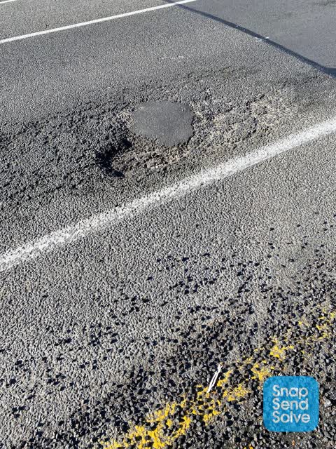 Pothole, a report photo