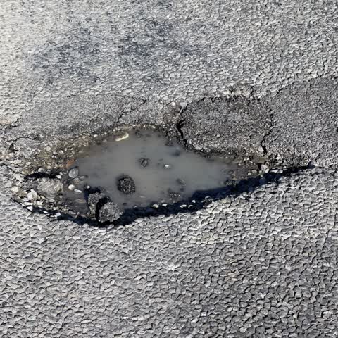 Pothole, a report photo