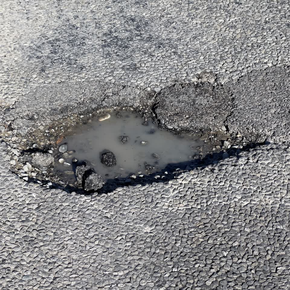 The photograph attached to this pothole report