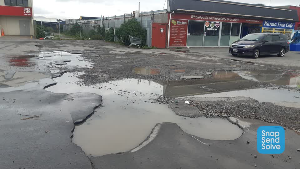 The photograph attached to this damaged road report