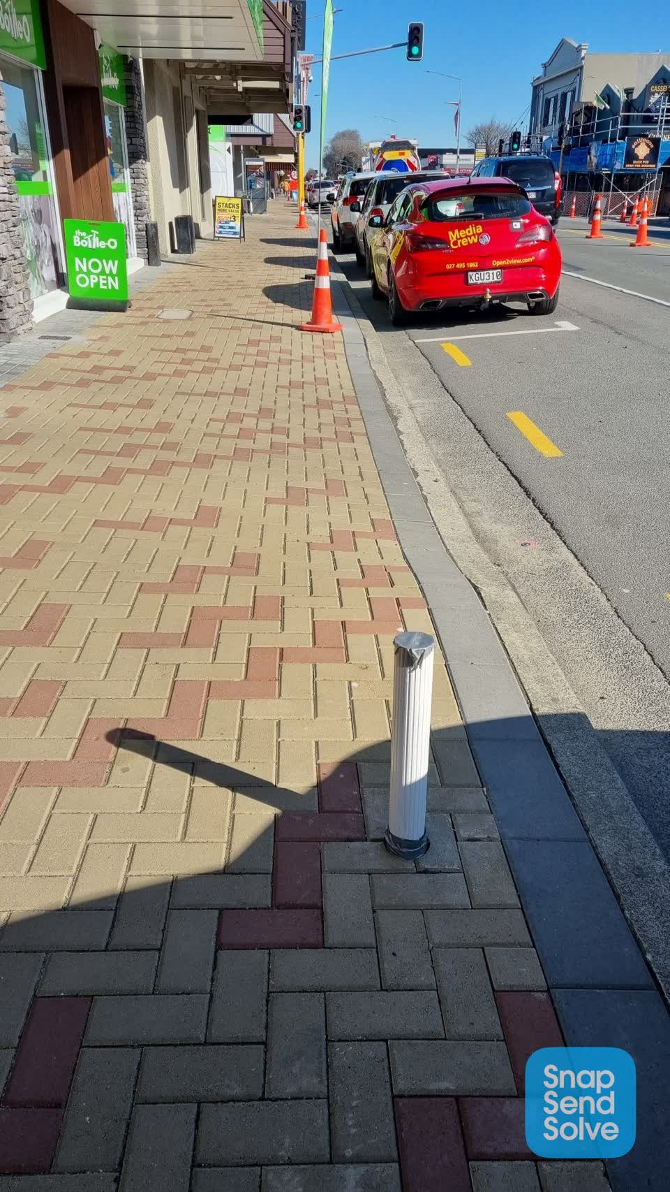 The photograph attached to this road signage report