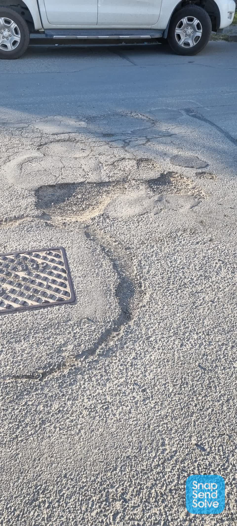 The photograph attached to this pothole report