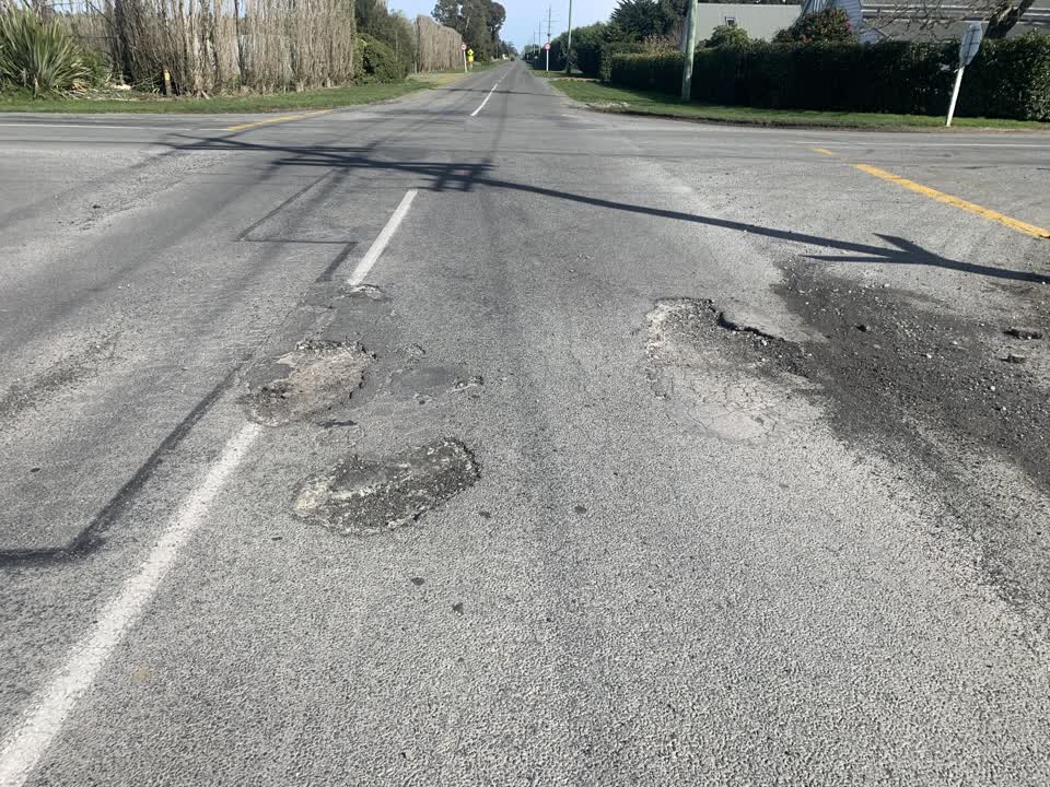 The photograph attached to this damaged road report