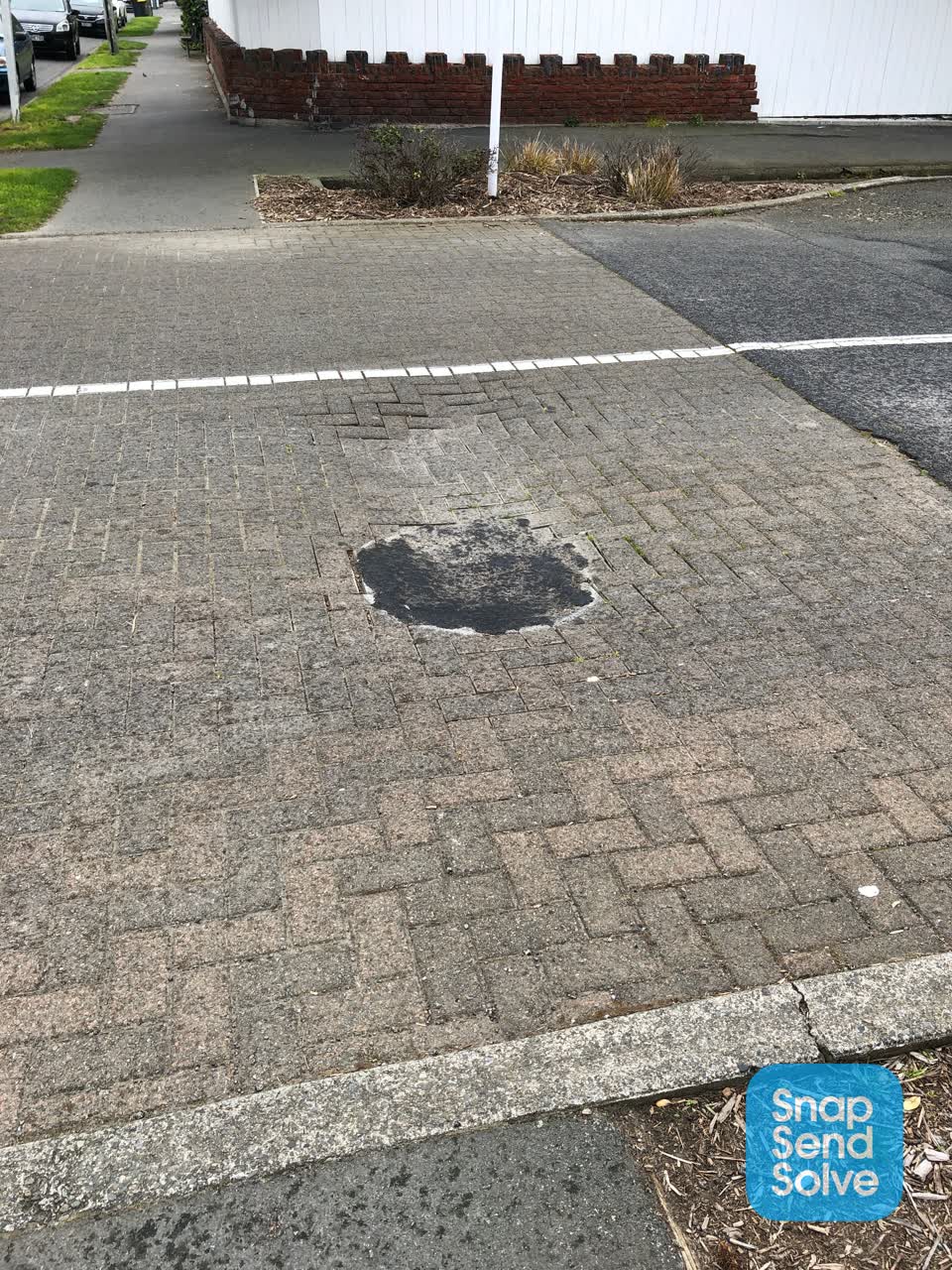 The photograph attached to this pothole report