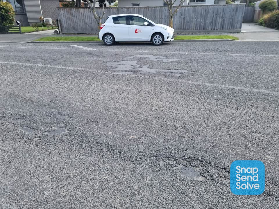 The photograph attached to this damaged road report