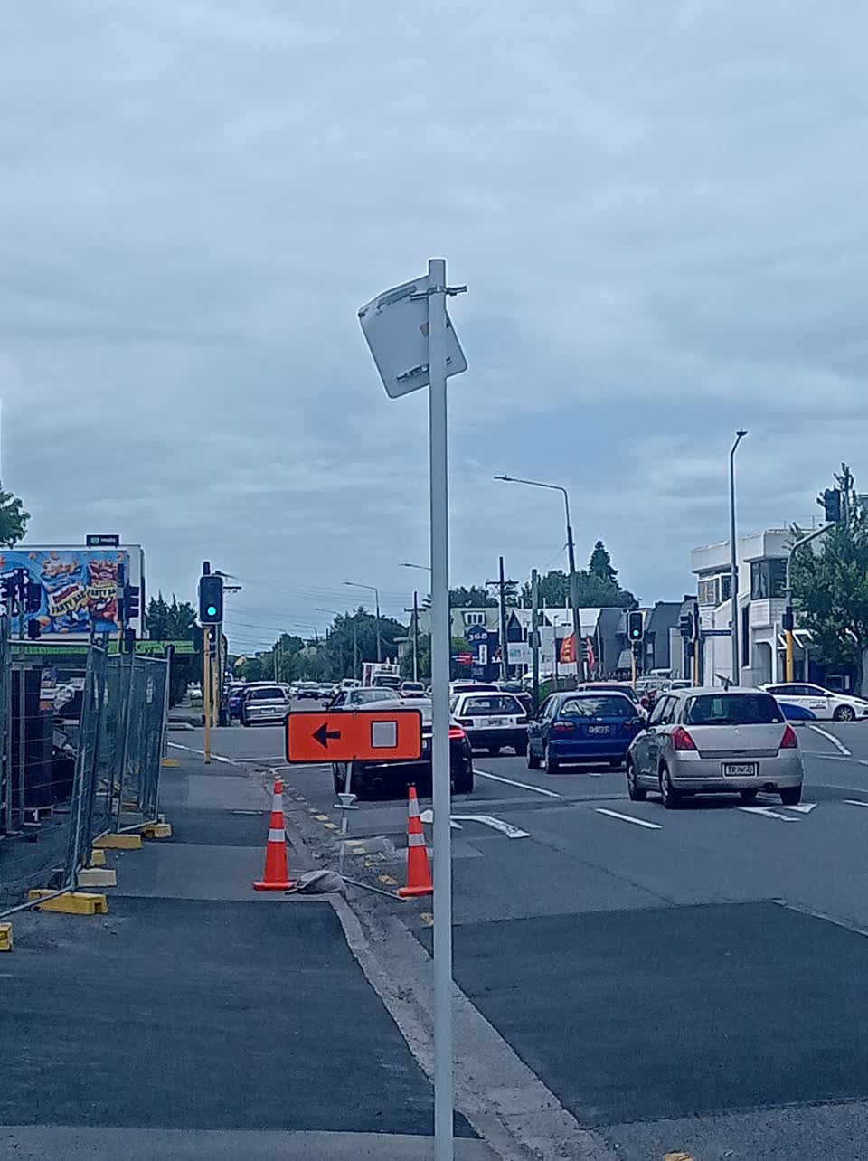 The photograph attached to this damaged street sign report