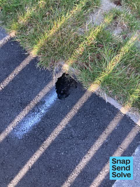 Pavement - Damaged, a report photo