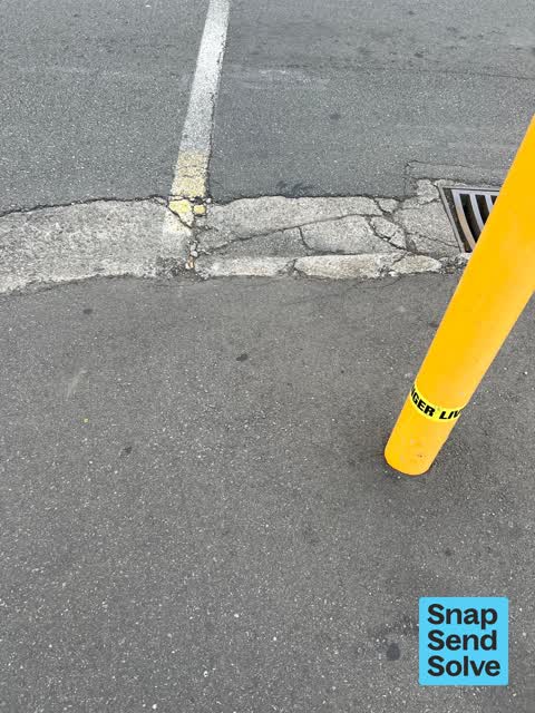 Pavement - Damaged — a report photo