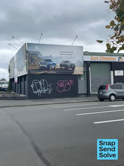Graffiti on a fence, building or structure, a report photo