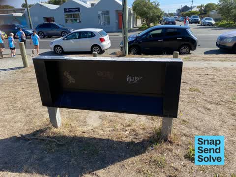 Graffiti on a sign, mural or public art, a report photo