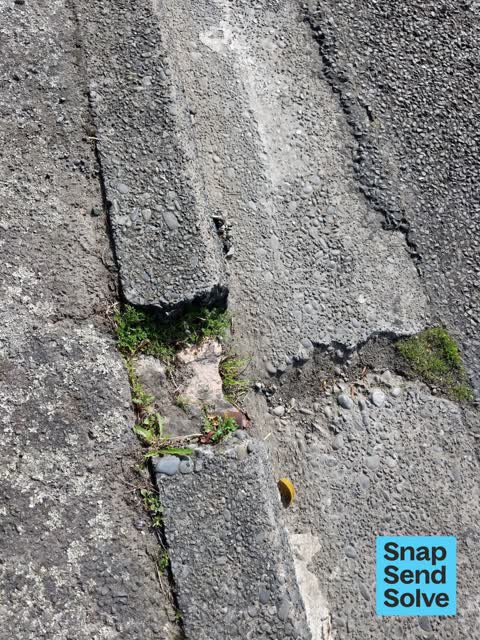 Pavement - Damaged, a report photo
