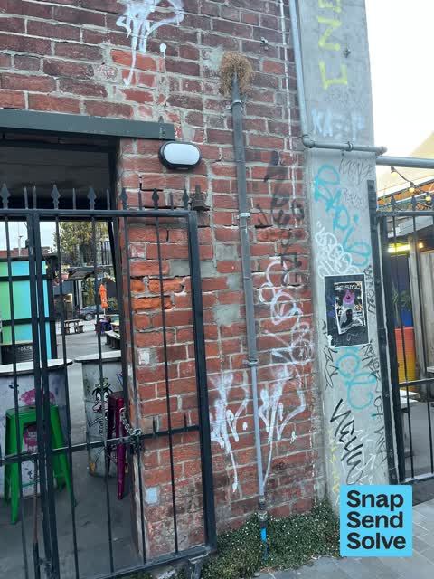 Graffiti on a fence, building or structure — a report photo