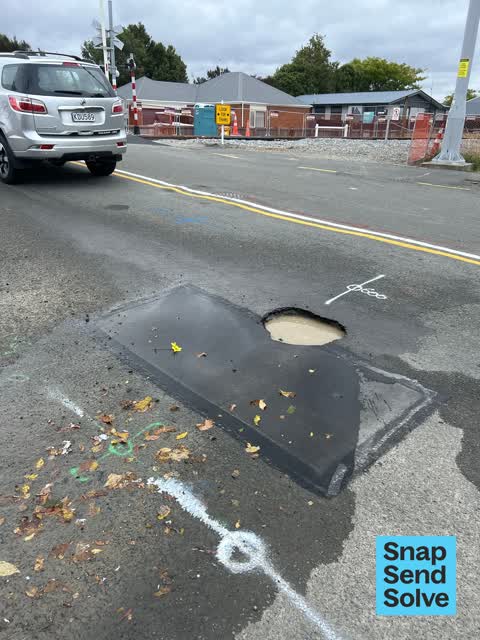 Pavement - Damaged — a report photo