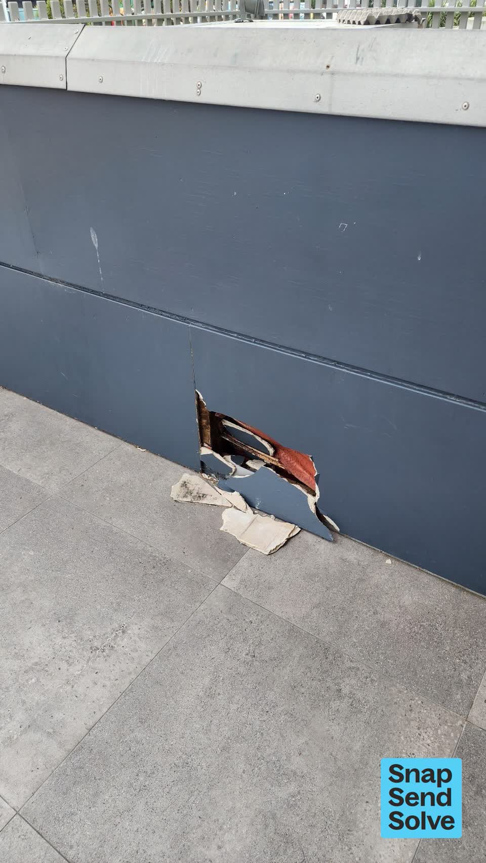 The photograph attached to this pavement - damaged report