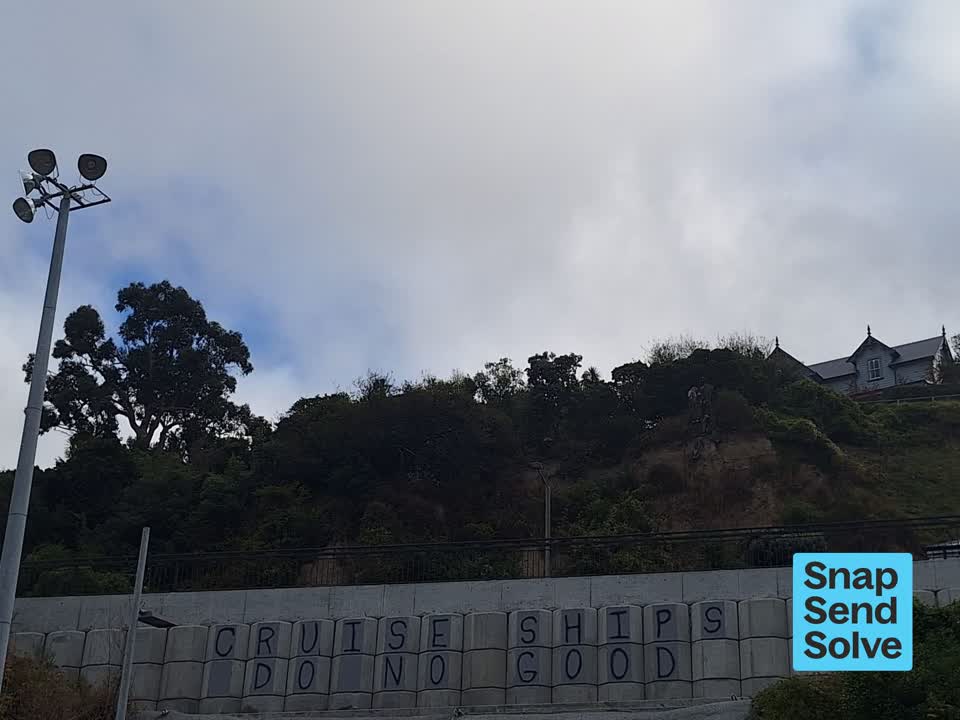 The photograph attached to this graffiti somewhere else report