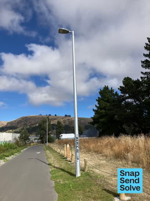 Graffiti on a cabinet, pole or railway asset — a report photo
