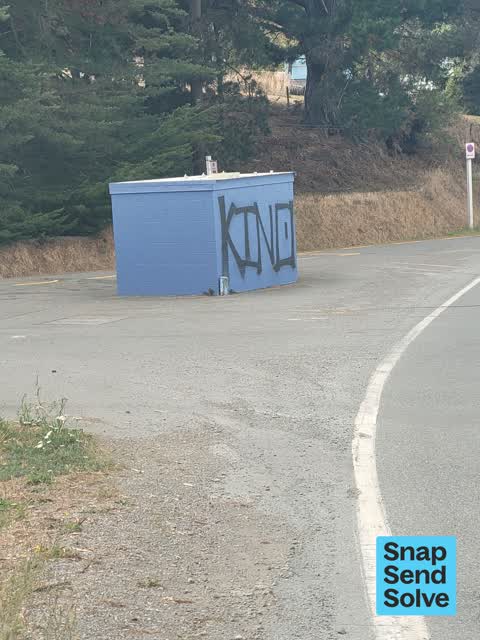 Graffiti on a bus stop or public toilet, a report photo