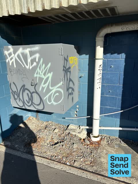 Graffiti on a fence, building or structure, a report photo