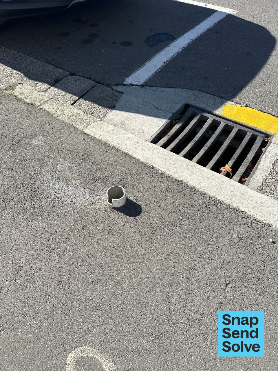 The photograph attached to this pavement - damaged report