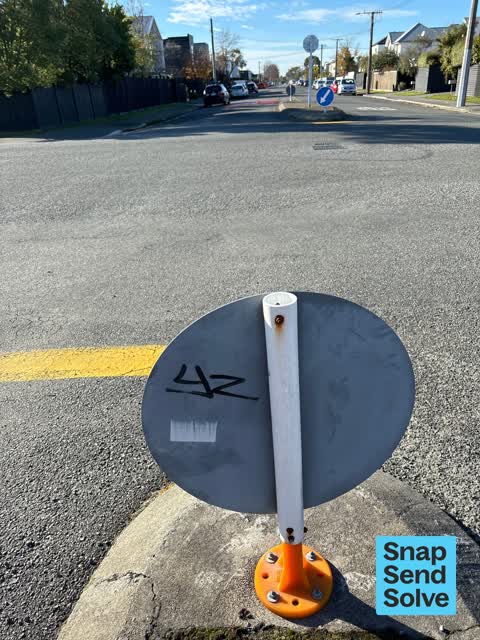 Graffiti on a sign, mural or public art, a report photo