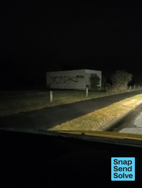 Graffiti on a fence, building or structure — a report photo