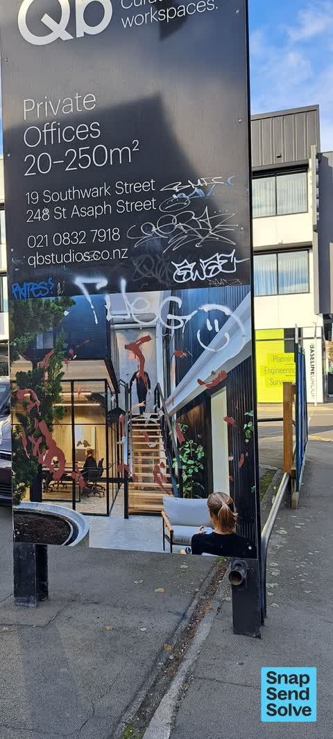 Graffiti on a sign, mural or public art, a report photo