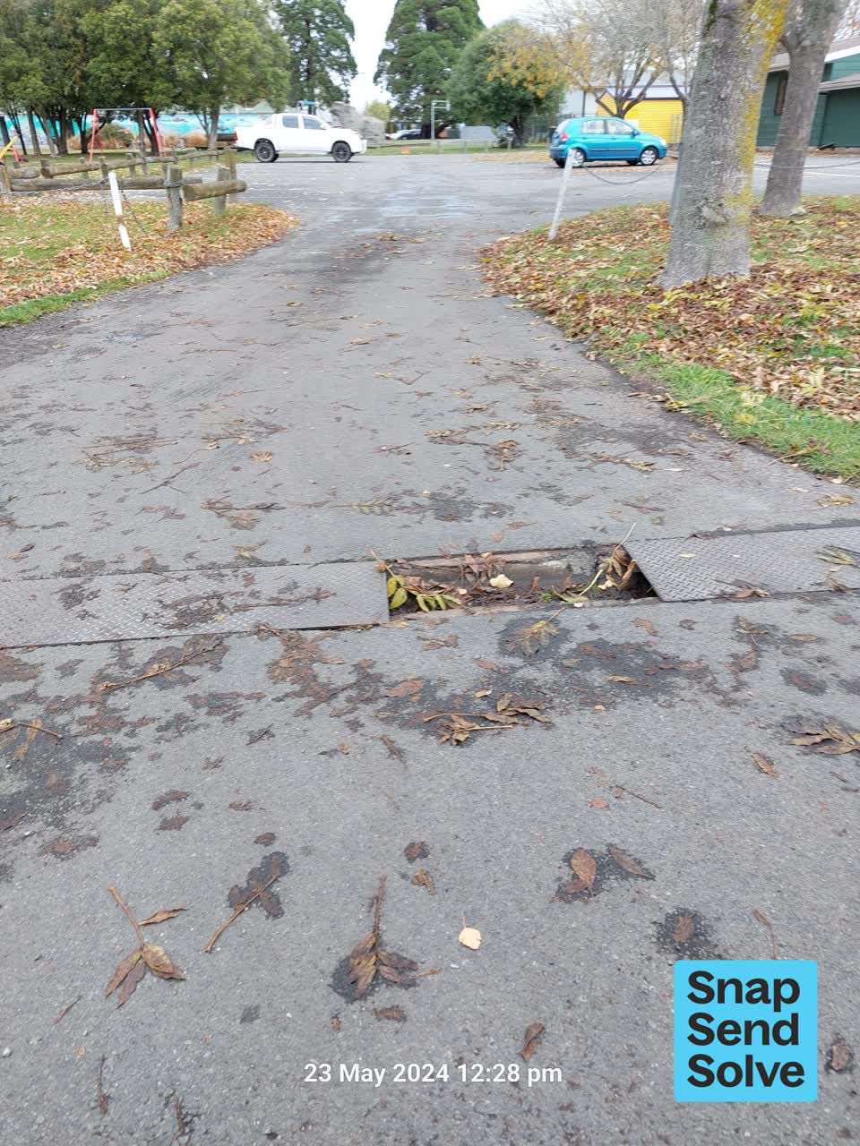 The photograph attached to this pavement - damaged report