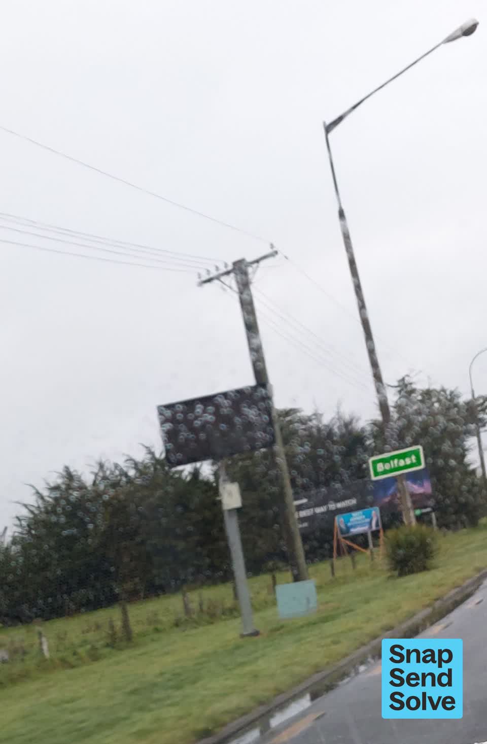 The photograph attached to this road signage report
