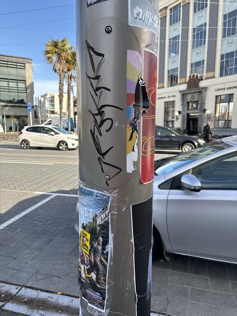 Graffiti on a cabinet, pole or railway asset — a report photo
