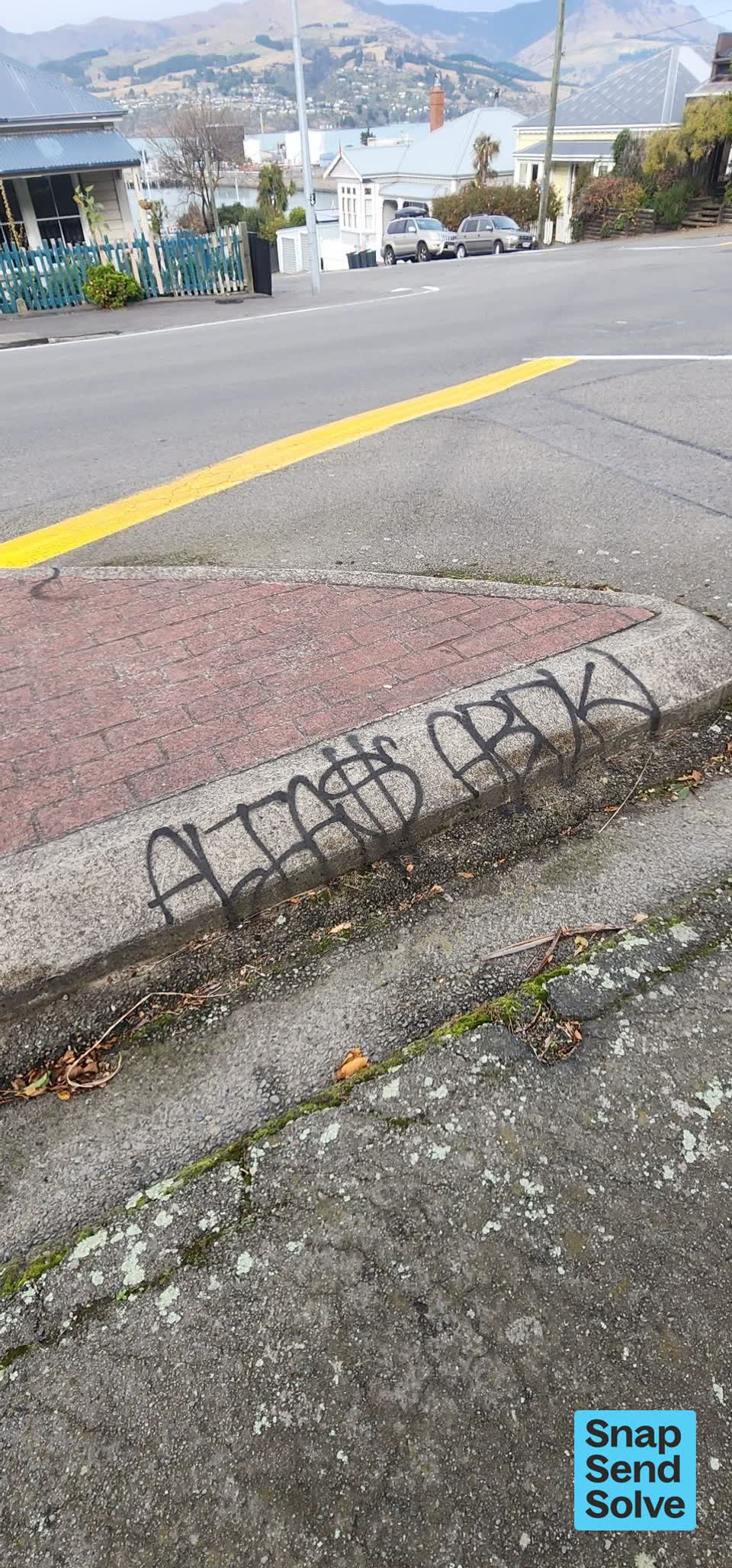 The photograph attached to this graffiti on a road, footpath or bridge report