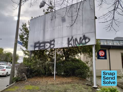 Graffiti on a fence, building or structure — a report photo