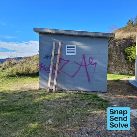 Graffiti on a fence, building or structure, a report photo