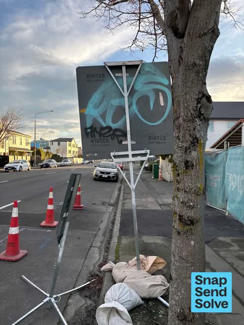 Graffiti on a sign, mural or public art, a report photo