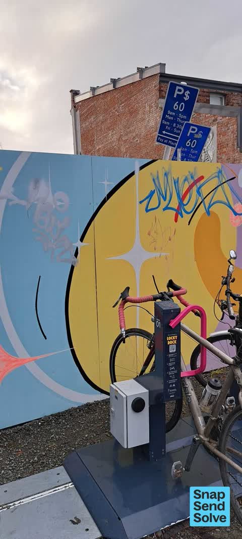 Graffiti on a fence, building or structure, a report photo