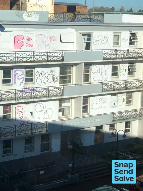 Graffiti on a fence, building or structure — a report photo