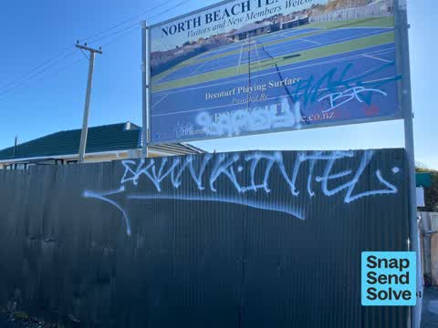 Graffiti on a fence, building or structure — a report photo