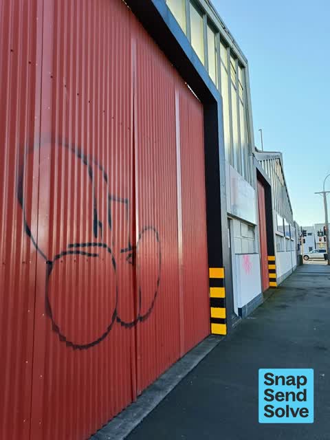 Graffiti on a fence, building or structure — a report photo