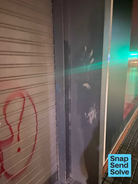 Graffiti on a fence, building or structure — a report photo