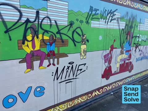 Graffiti on a fence, building or structure, a report photo