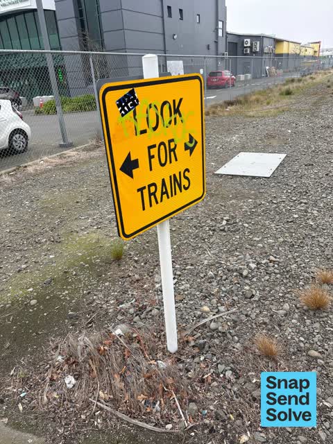 Graffiti on a sign, mural or public art, a report photo