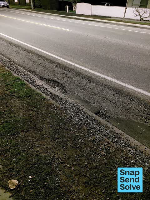 Pothole, a report photo