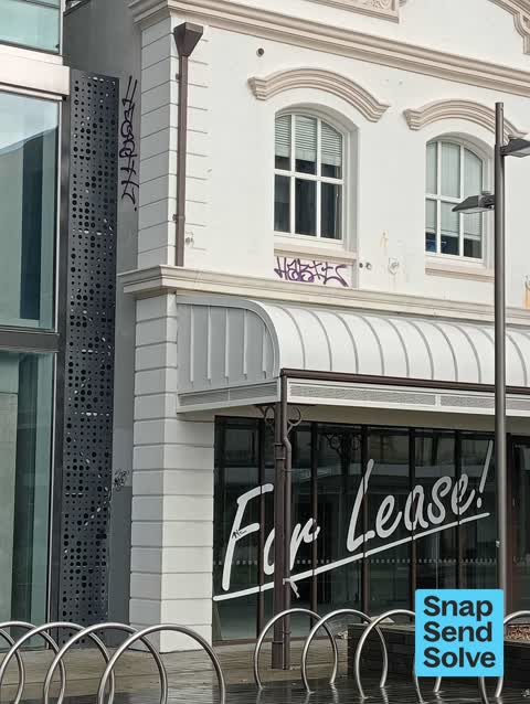 Graffiti on a fence, building or structure — a report photo