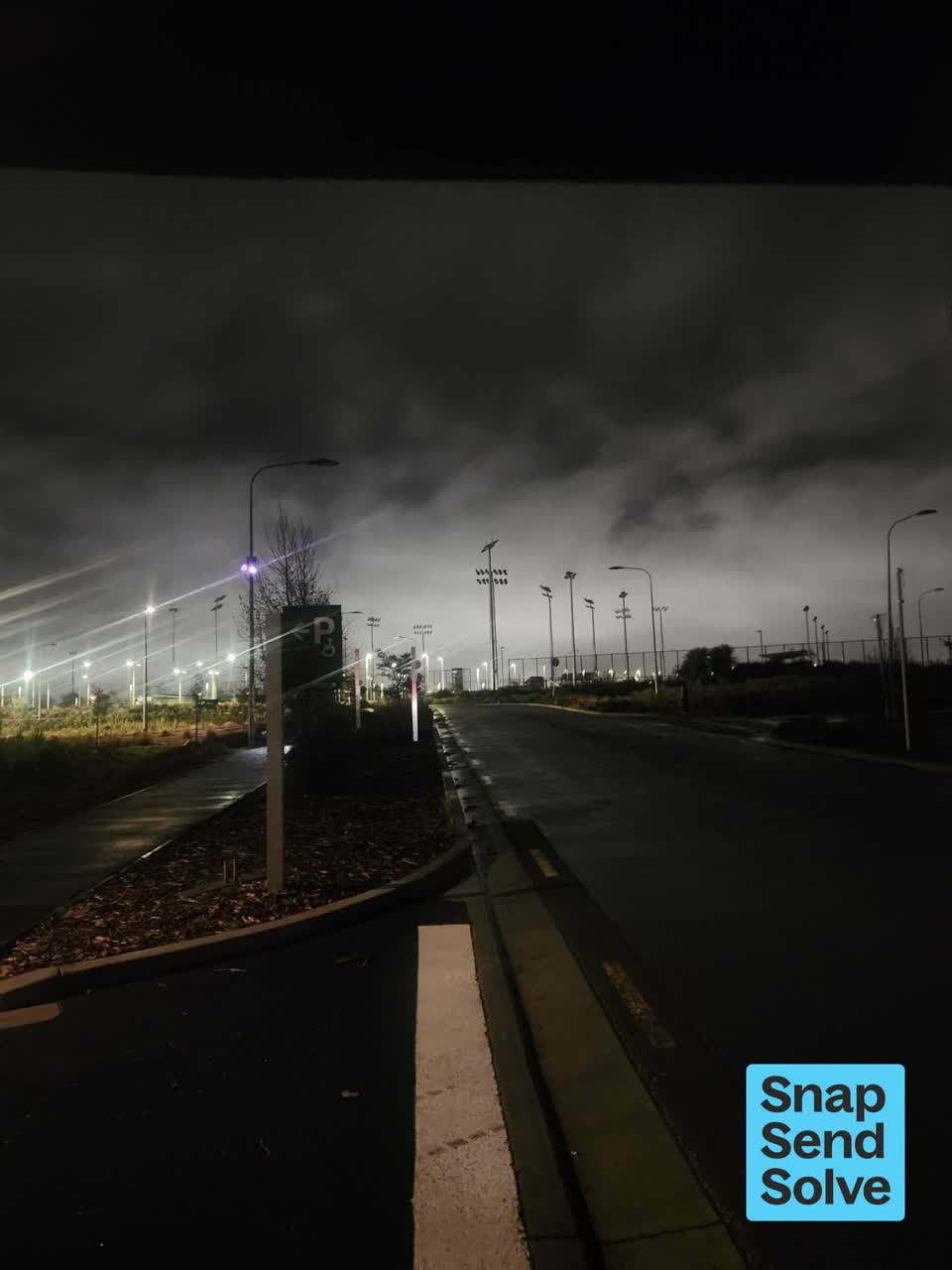 The photograph attached to this street light outage report
