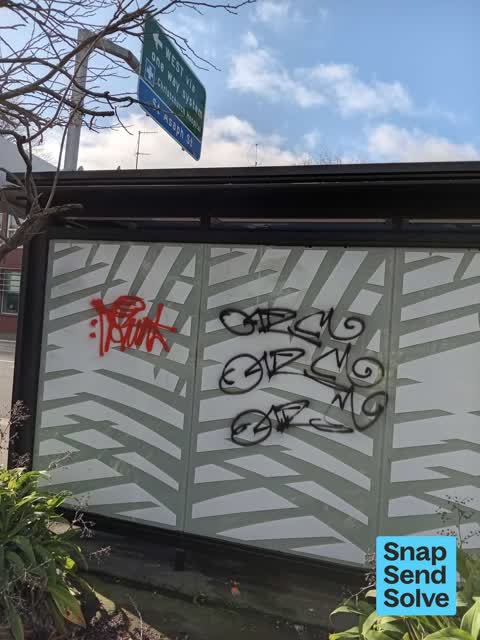Graffiti on a bus stop or public toilet, a report photo