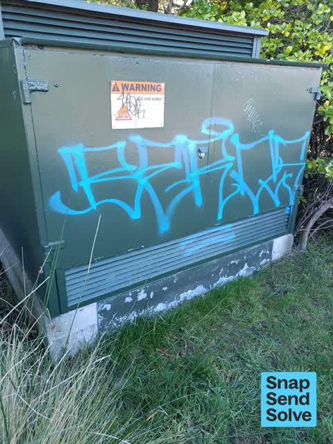 Graffiti on a cabinet, pole or railway asset — a report photo