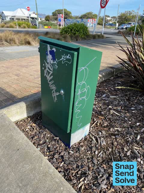 Graffiti on a fence, building or structure — a report photo