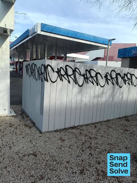 Graffiti on a fence, building or structure — a report photo