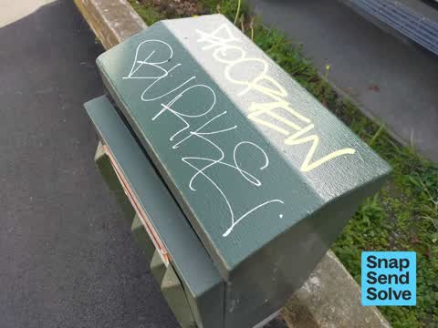 Graffiti on a cabinet, pole or railway asset — a report photo