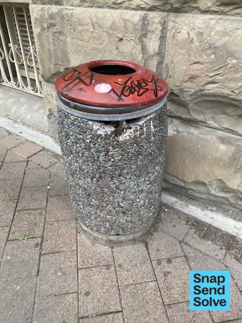 Graffiti on a fence, building or structure, a report photo